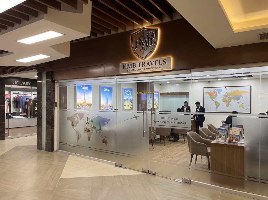 HMB Travels storefront at Javed Center, Moon Market, Iqbal Town, Lahore